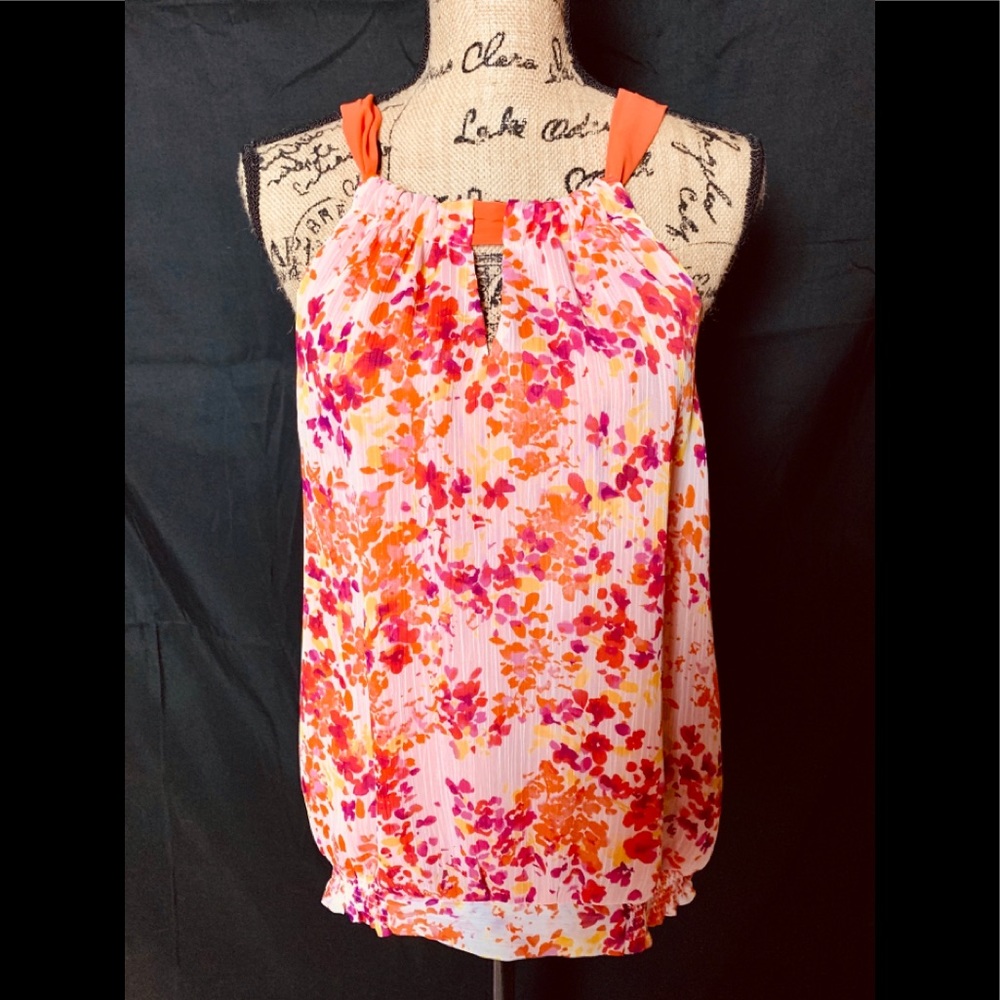 sleeveless blouseVibrant and feminine colors! 3/15